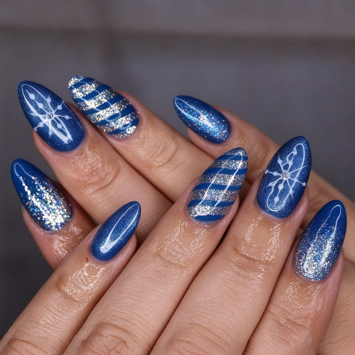 Glamorous artificial nails with glitter and pattern design Kalsten
