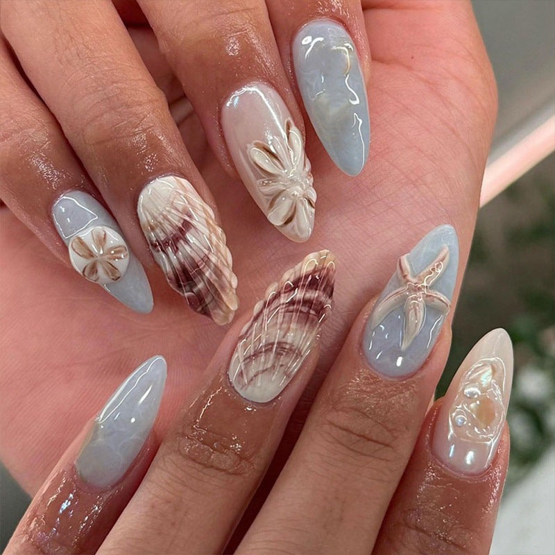 Artificial nails with maritime shell motifs Kalsten