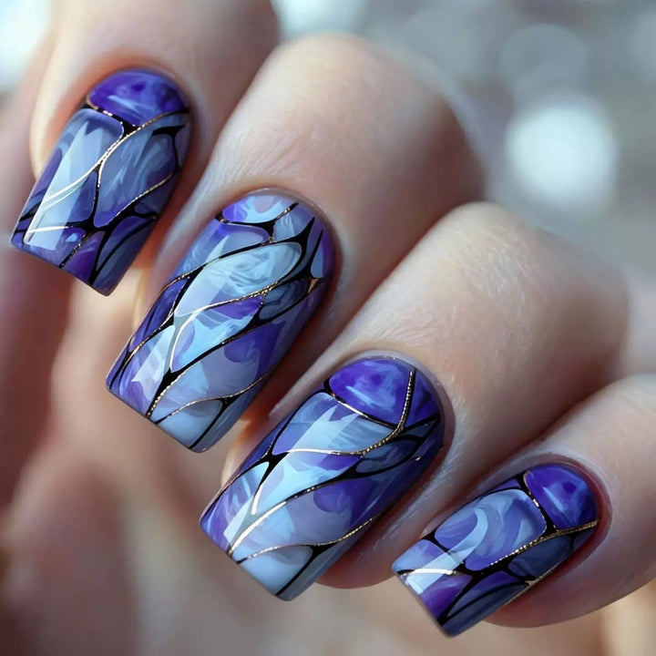 Acrylic nail set with luxurious marble design and elegant accents Kalsten