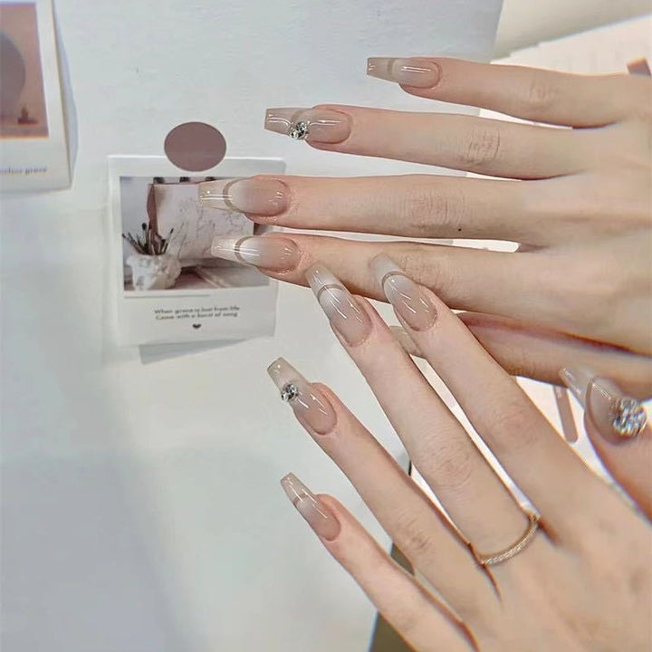Glamorous artificial nails with elegant rhinestone decorations Kalsten