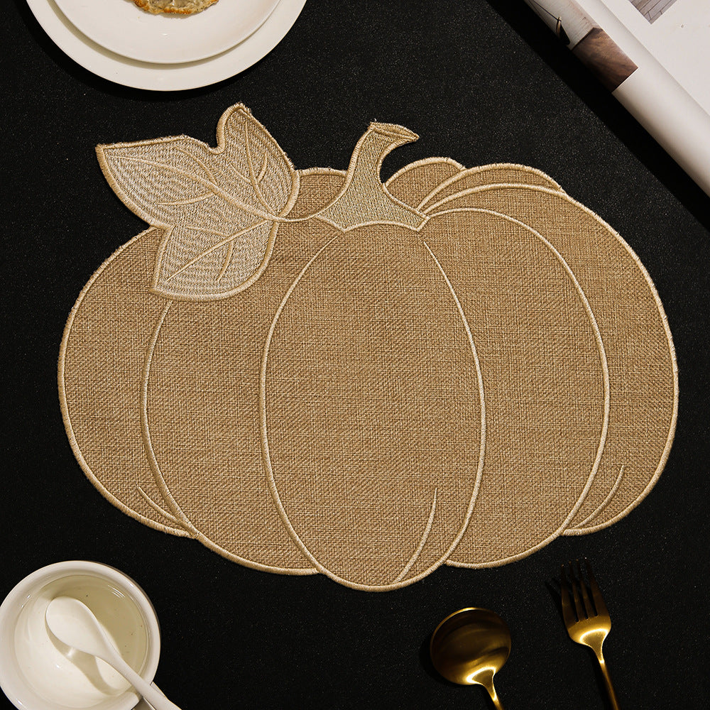 Pumpkin-shaped table set made of linen look with quilted contours and heat-resistant placemat