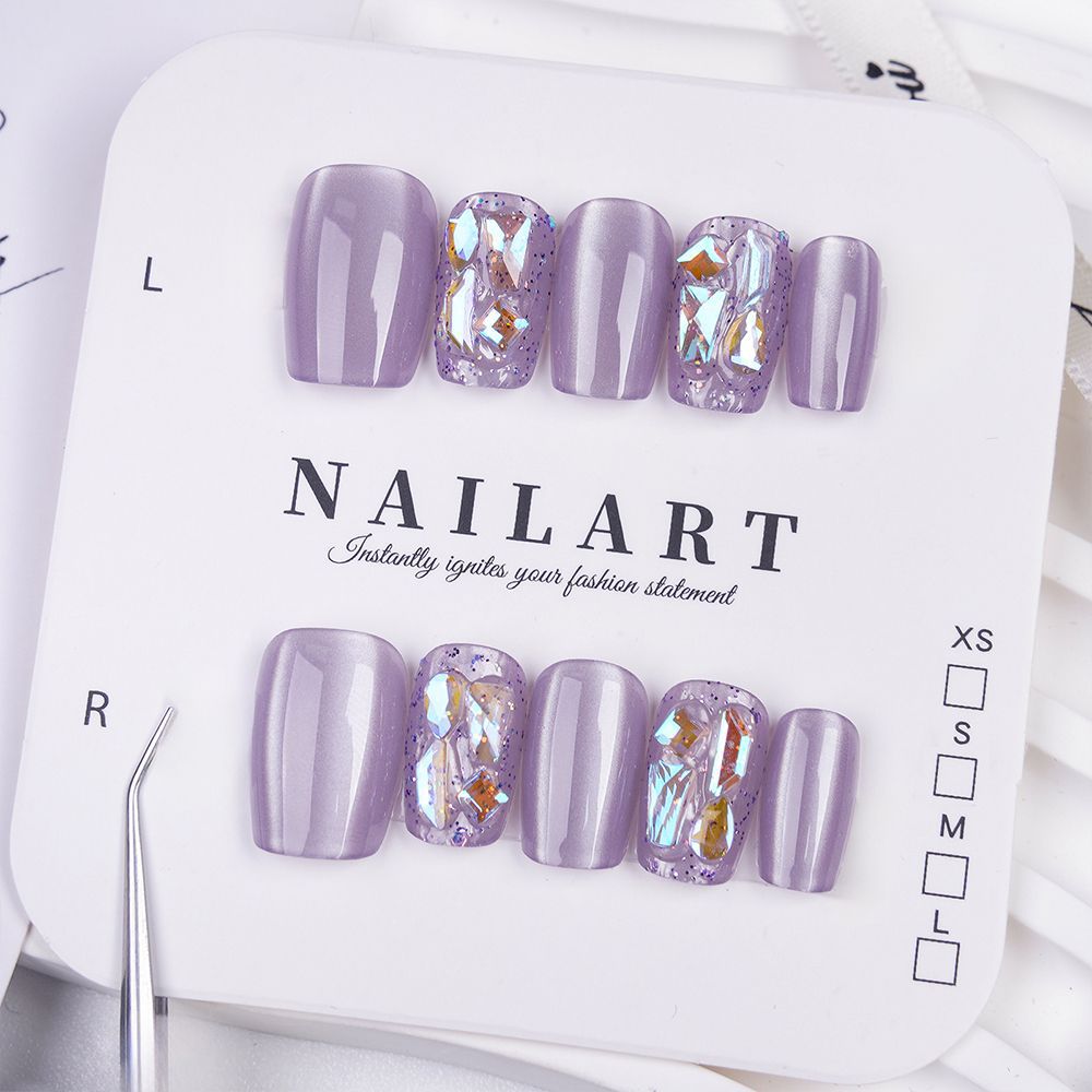 Acrylic nails with glitter accents and modern designs Kalsten