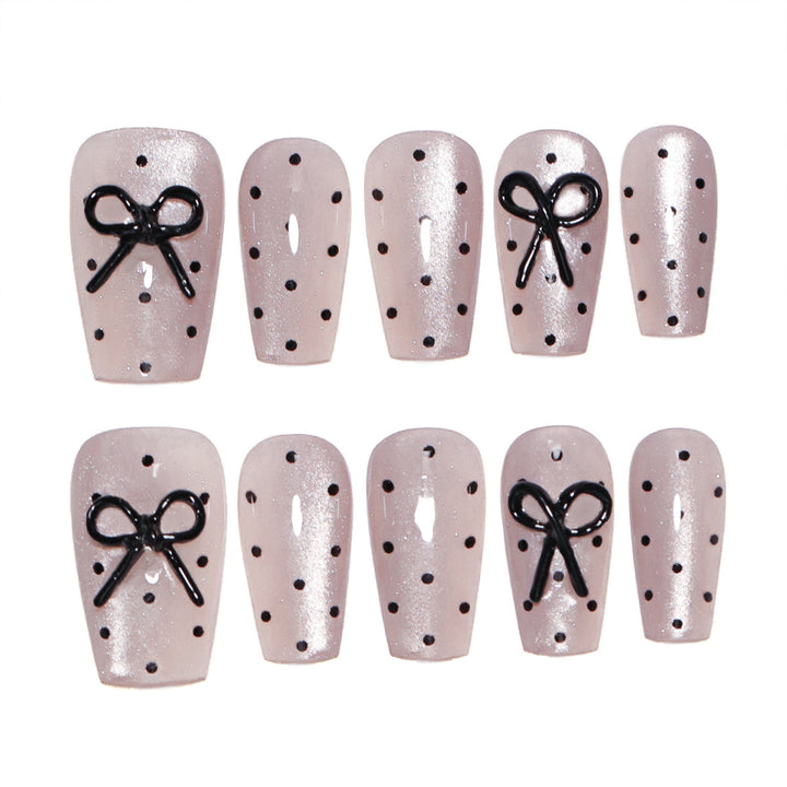 Artful Nail Extensions with Bow Pattern Kalsten