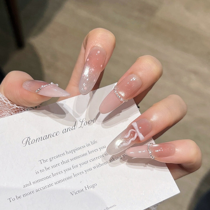 Elegant Long Press-On Nails with Decorative Accents Kalsten