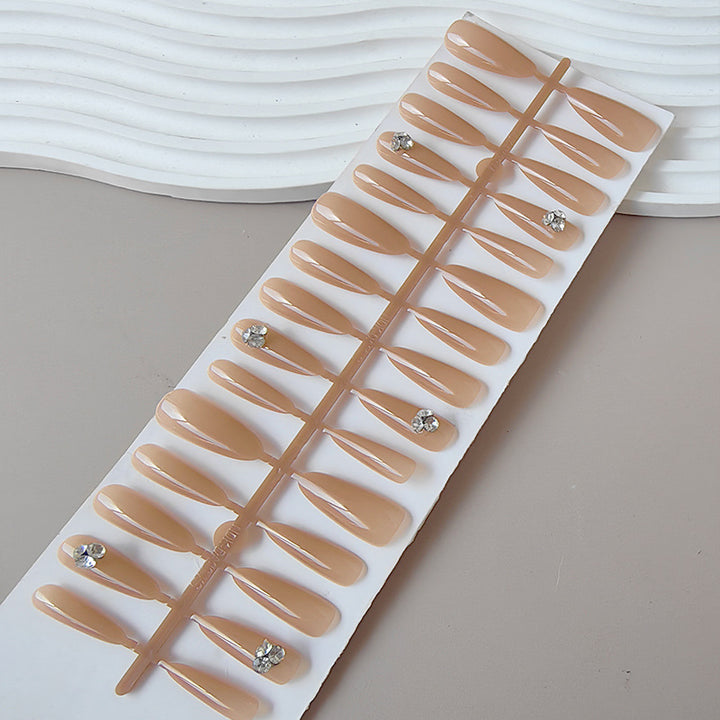 Acrylic nails with glamorous stone accents Kalsten
