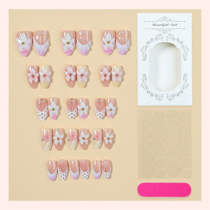 Artificial nail set with delicate floral designs and elegant accents Kalsten