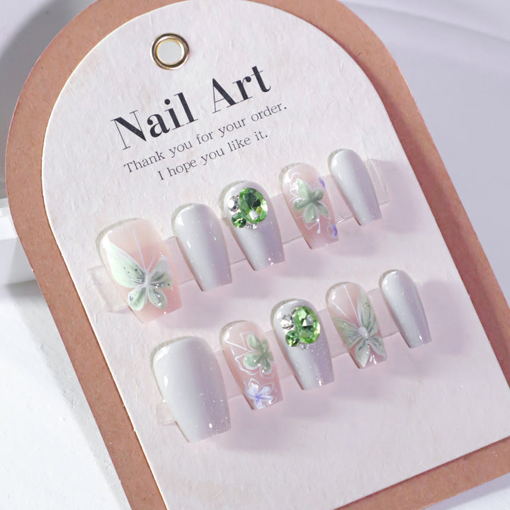 Elegant Nail Art with Floral Accents Kalsten