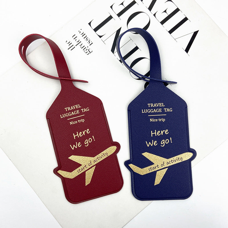 premium leather travel luggage ID tag with embossed airplane motif and adjustable strap Kalsten