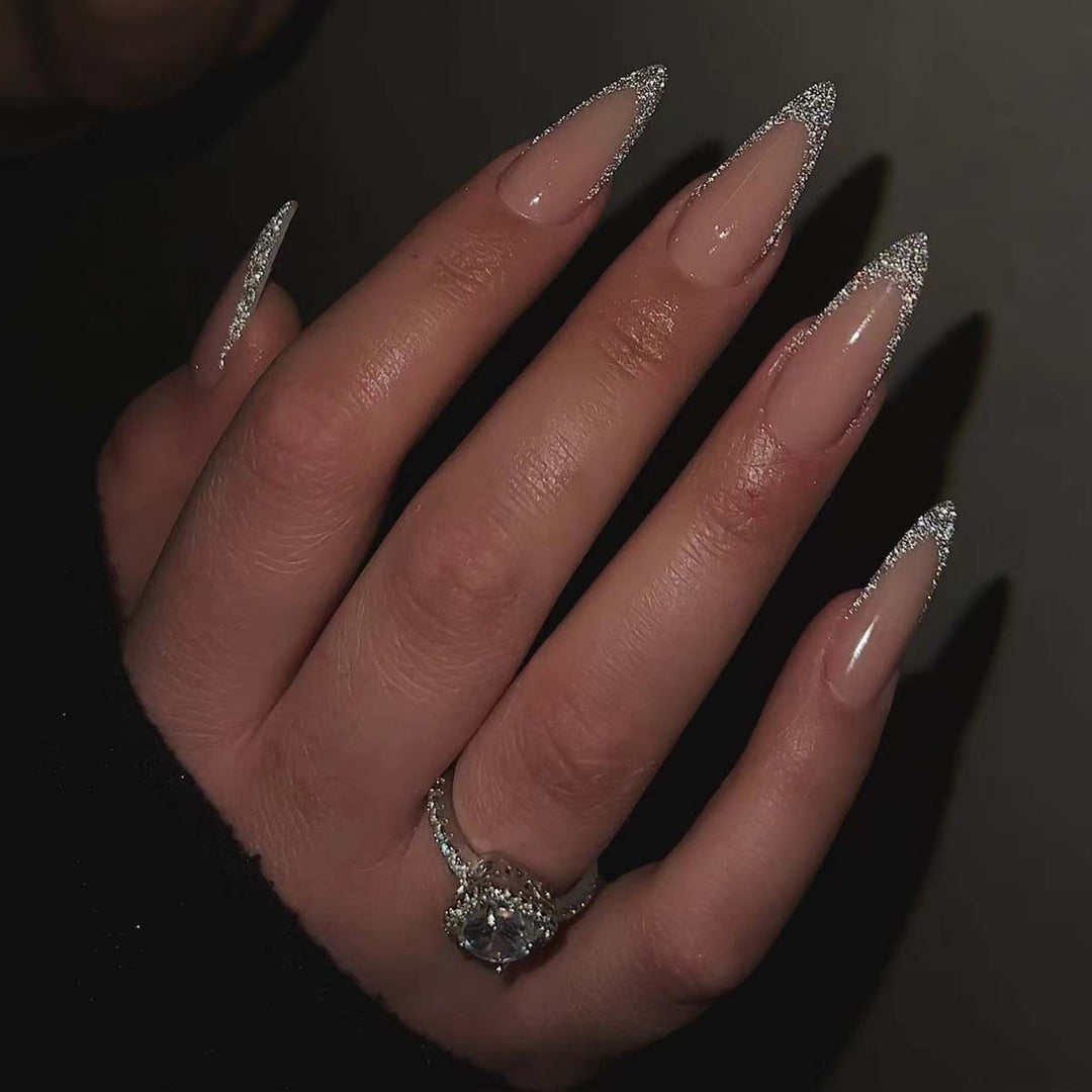 Glamorous stiletto artificial nails with glitter tips Kalsten