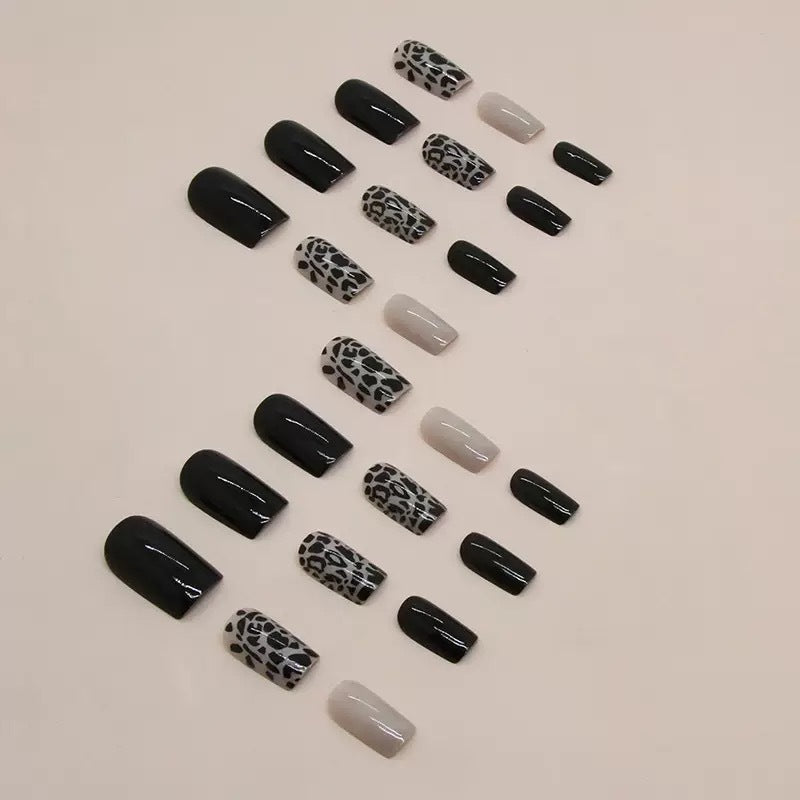 Acrylic nail set with stylish leopard pattern and elegant accents Kalsten