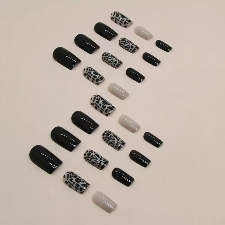 Acrylic nail set with stylish leopard pattern and elegant accents Kalsten