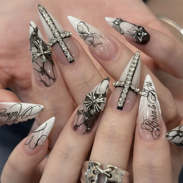 Artful stiletto nails with elegant embellishments Kalsten