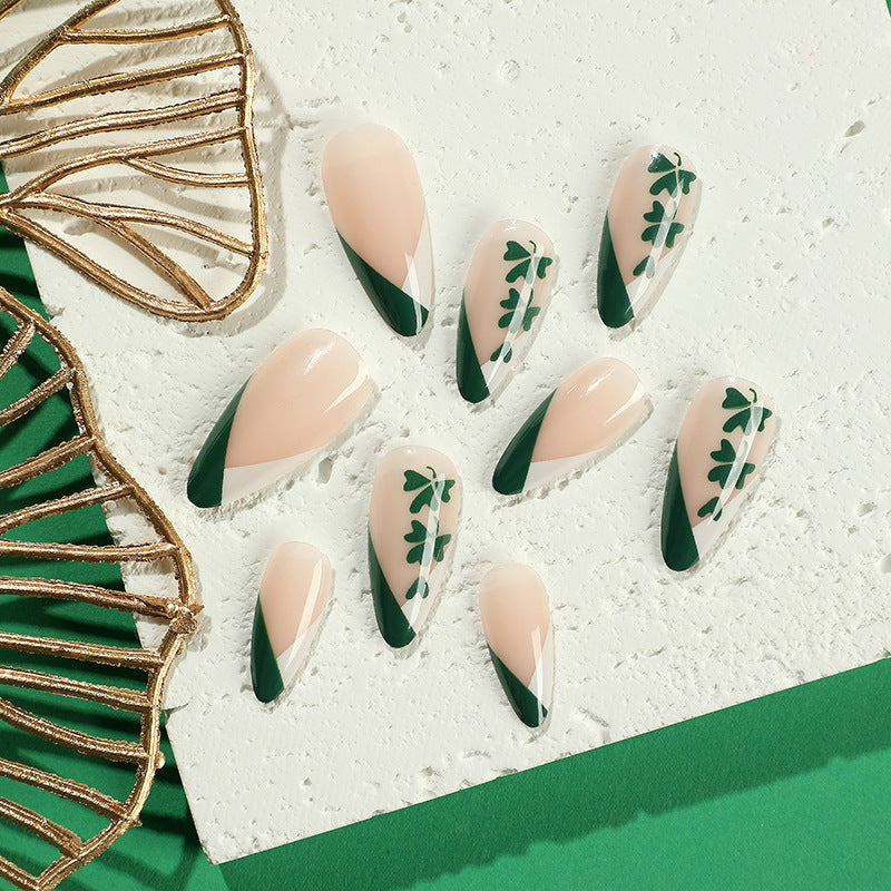 Artistic stiletto nails with cloverleaf design Kalsten