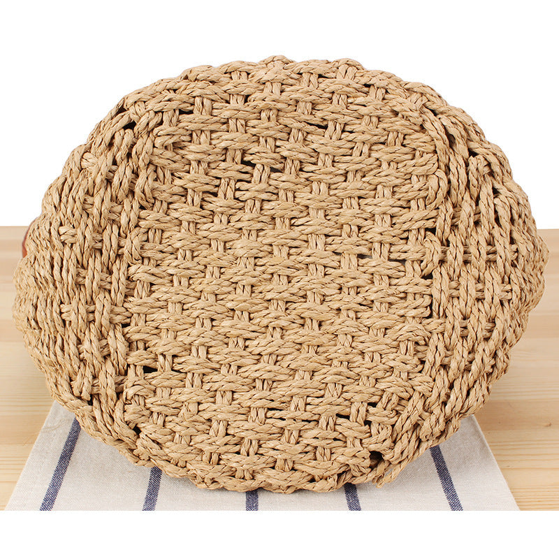 Shoulder bag made of hand-woven natural material with stylish leather accents Kalsten