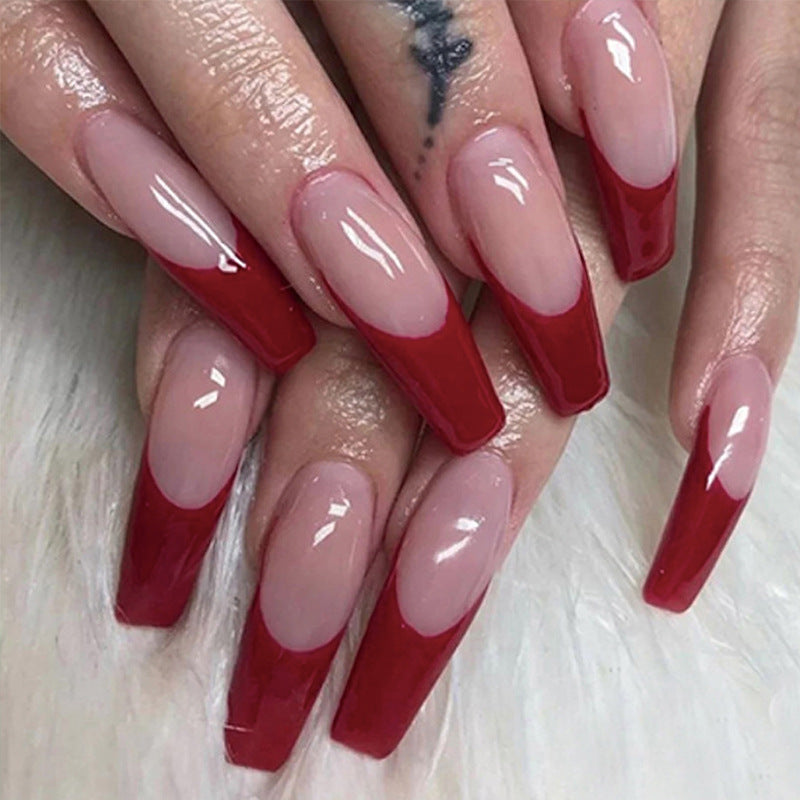 Elegant artificial nails with high-gloss finish and prominent French tip Kalsten