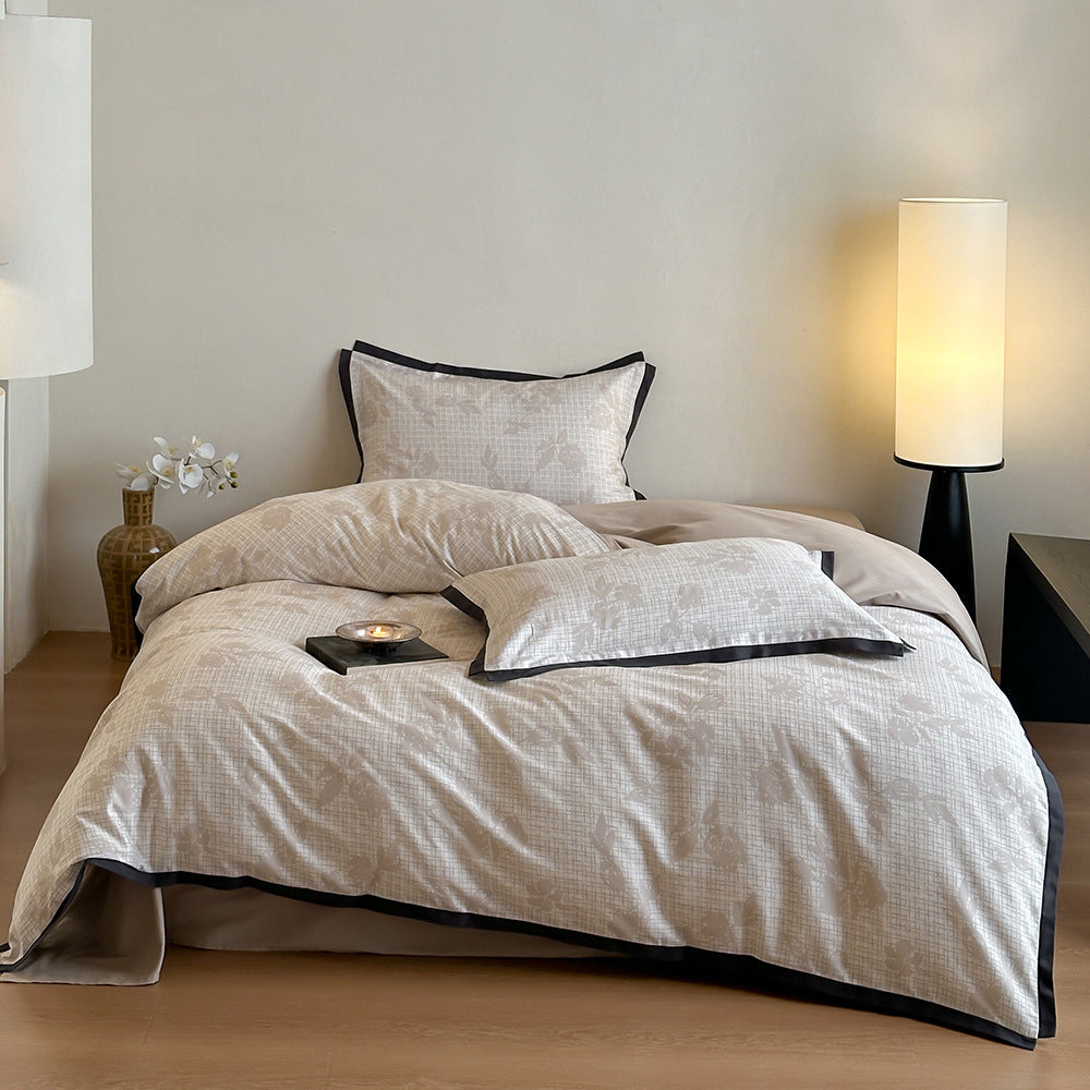 Duvet cover set with fine check pattern and subtle floral relief made of cotton blend