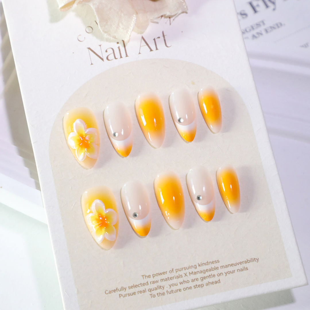 Artful nail extensions with delicate ombre effect and floral accents Kalsten