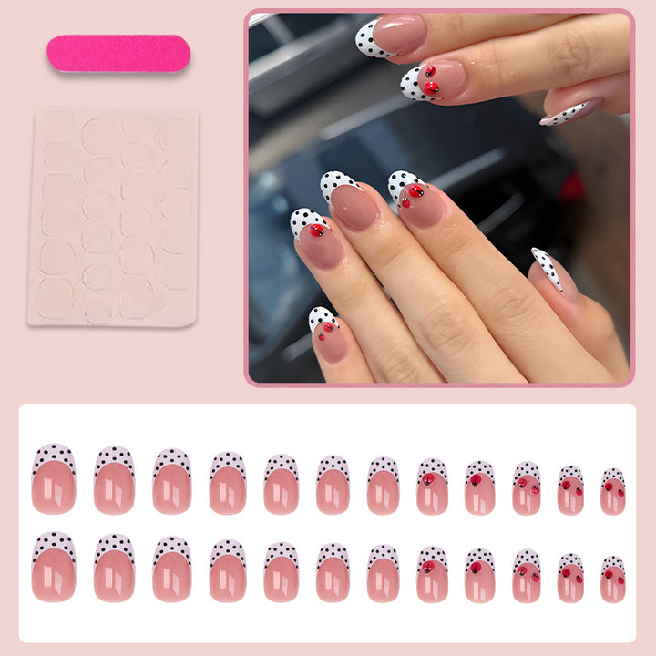 Artificial nail set with playful dots and eye-catching accents Kalsten