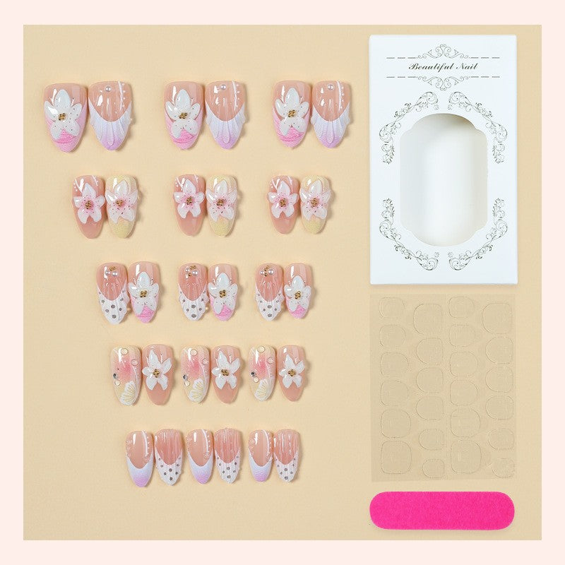 Nail art set with elegant floral design and glitter accents Kalsten