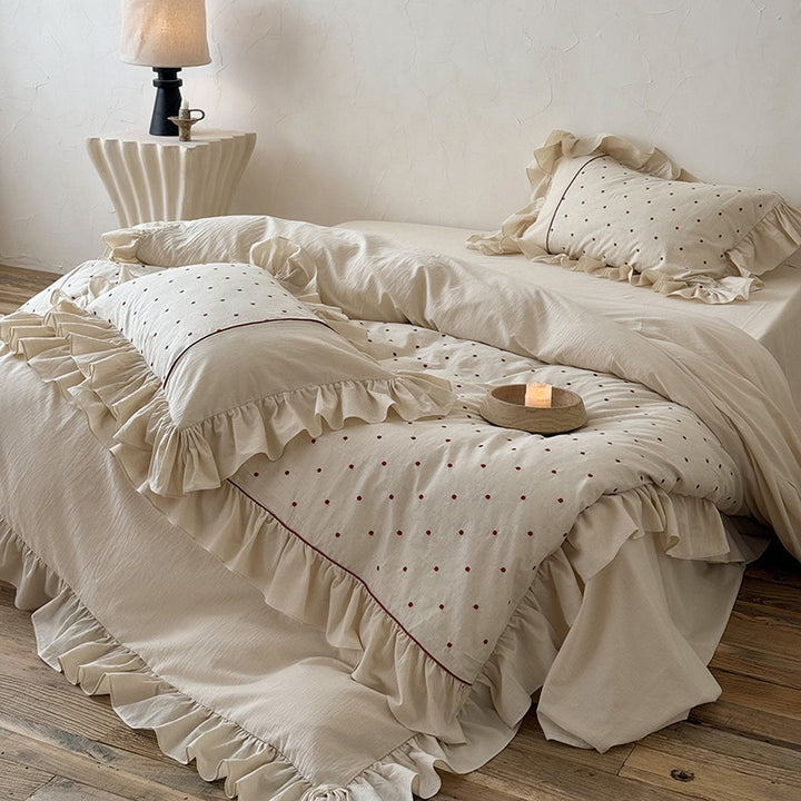 Duvet cover set with ruffle, embroidered dots, and stonewashed cotton finish