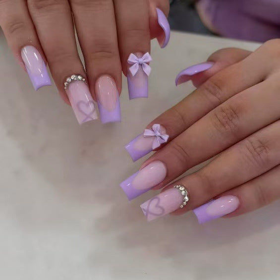 Artificial nail set with elegant 3D bows and glitter details Kalsten