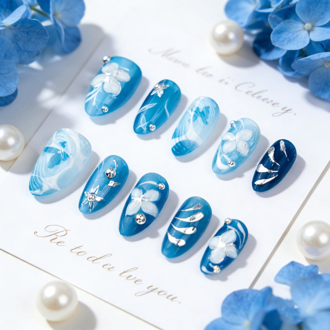 Artificial nail set with floral accents and elegant glitter elements Kalsten