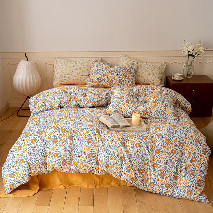 Quilted bedding set with floral vintage look and breathable cotton cover