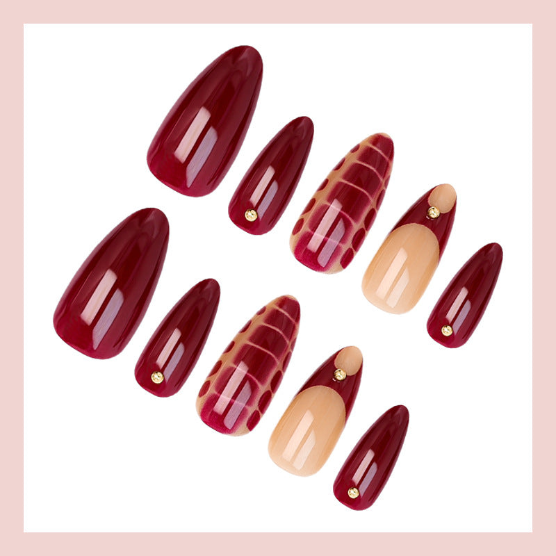 Acrylic nail set with elegant golden accents and trendy design Kalsten