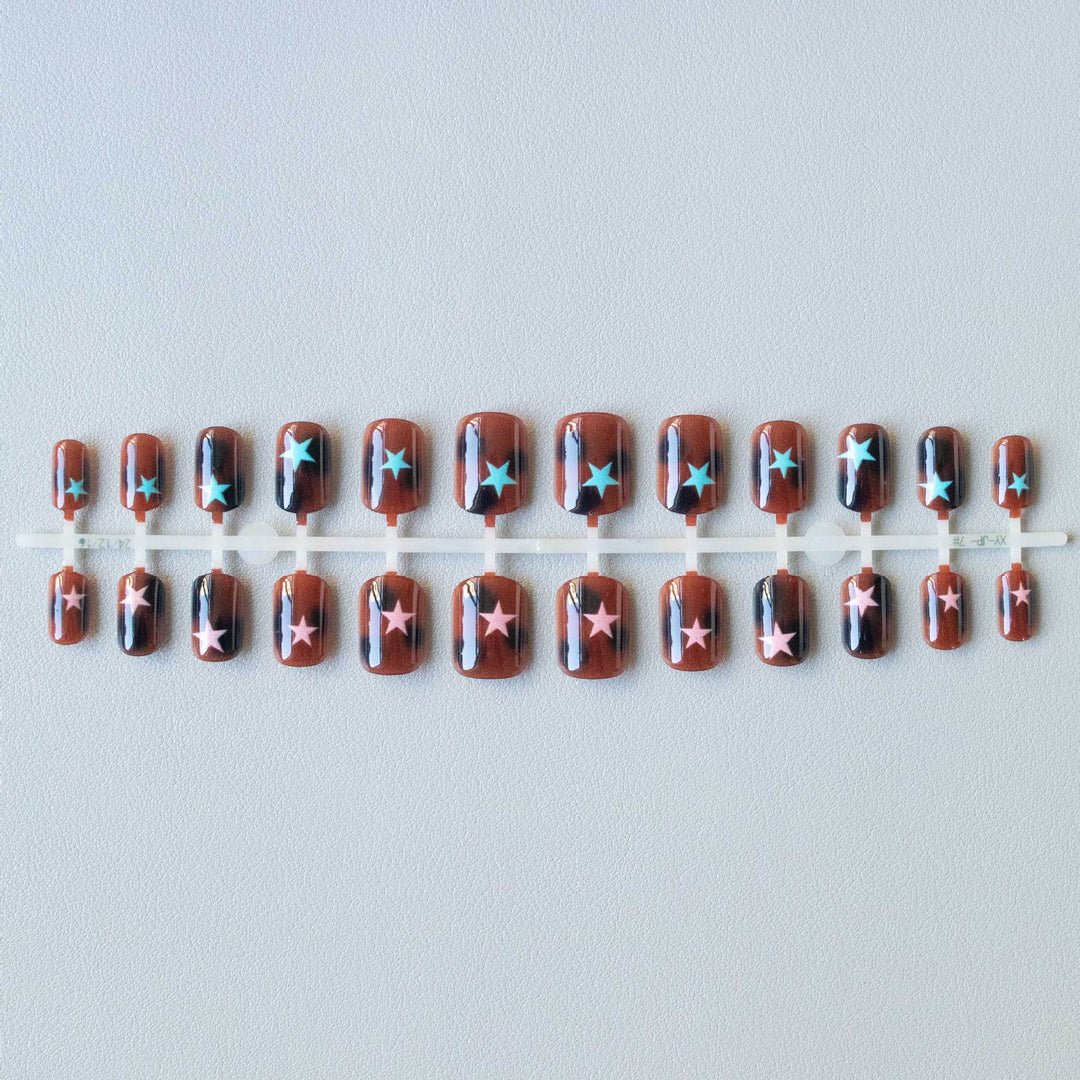 Artistic Star Motif Nail Art