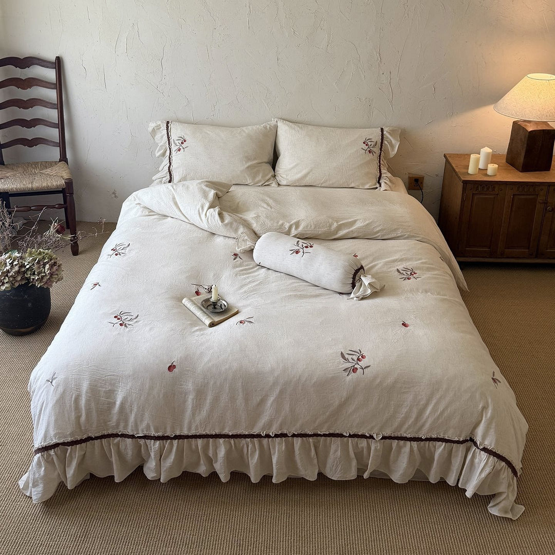 Linen bedding set with cherry embroidery and ruffles