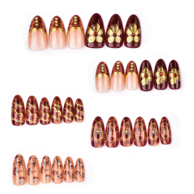Deluxe artificial nails with golden accents Kalsten