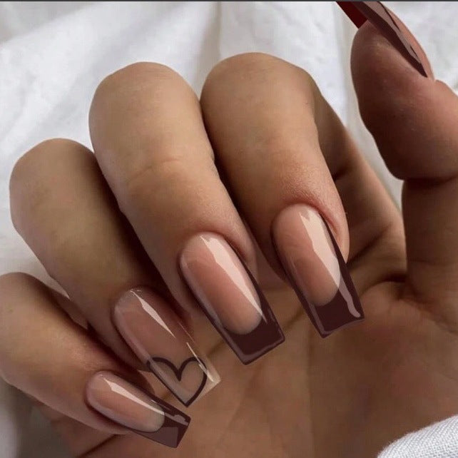 Glamorous artificial nails with elegant tips and heart design Kalsten