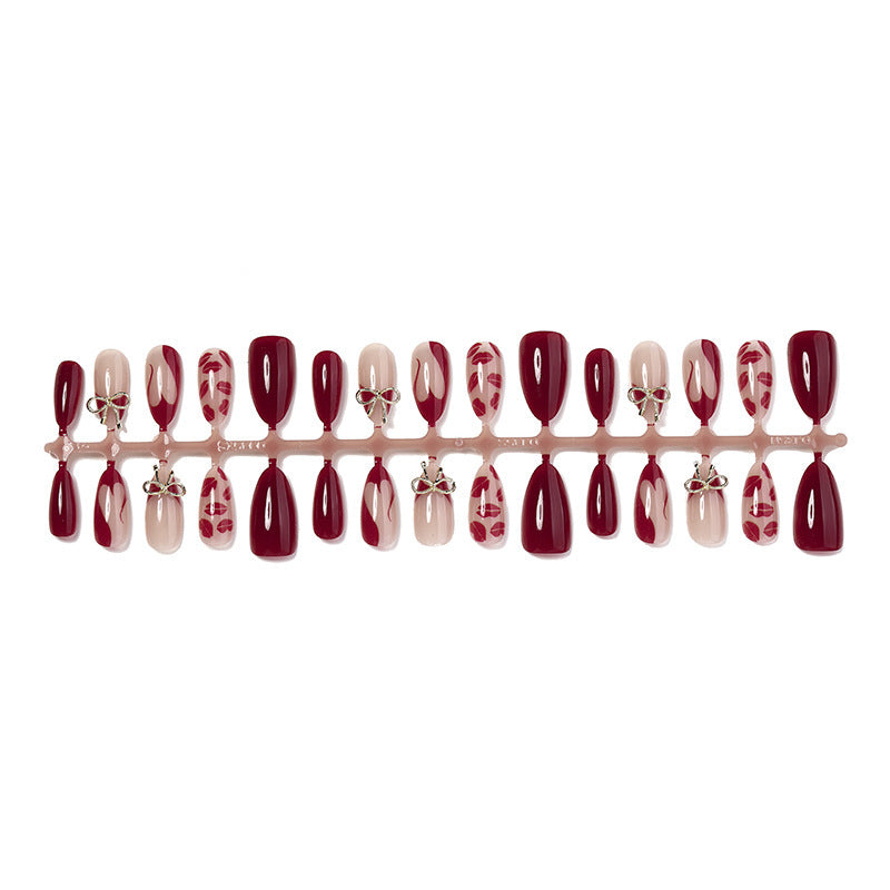 Artificial nail set with elegant bow and lip designs Kalsten