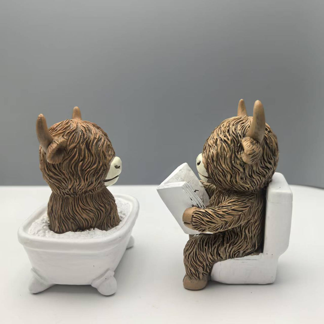 Funny decorative figure of a Highland cow in a bathtub Kalsten
