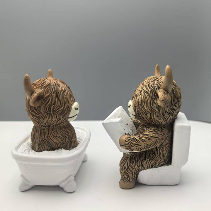 Funny decorative figure of a Highland cow in a bathtub Kalsten
