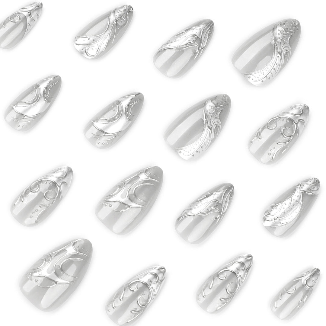 Artistic stiletto nails with elegant silver design Kalsten