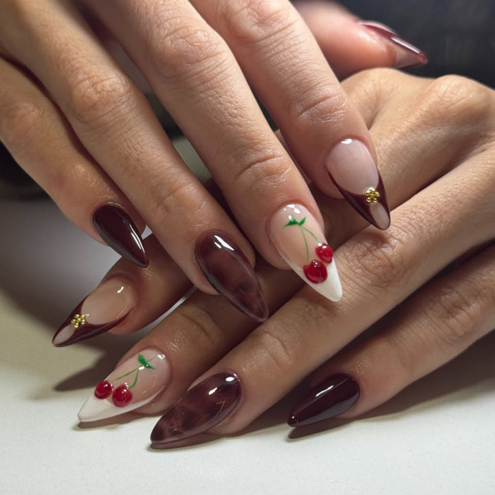 Artificial nail art with cherry blossom design Kalsten