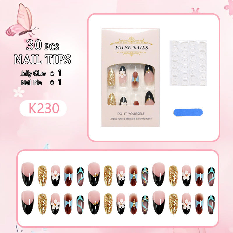 Artificial nail set with filigree floral decorations and glamorous accents Kalsten