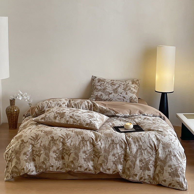 Luxurious cotton bedding set with abstract floral print and reversible function