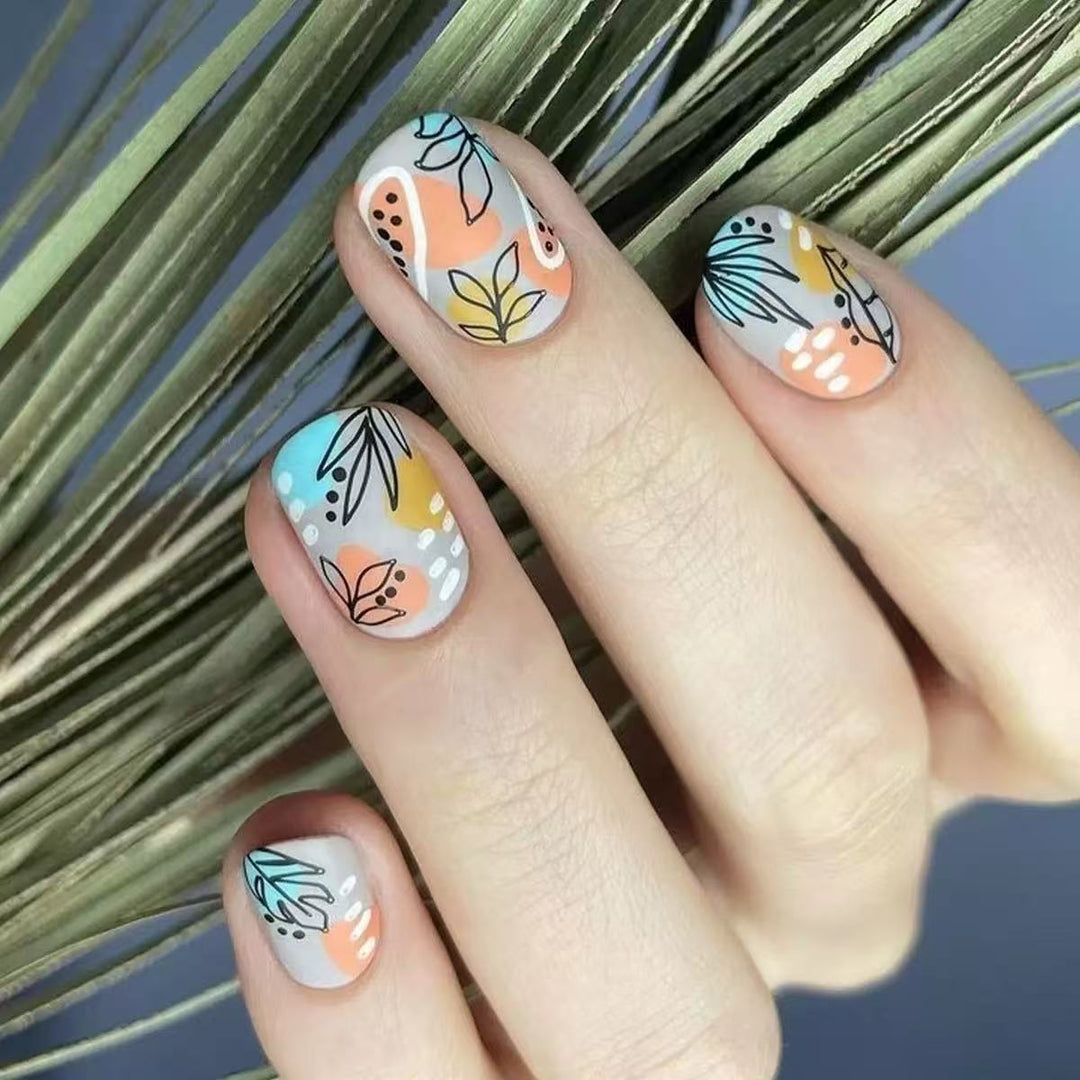 Nail art set with floral accents and creative design Kalsten