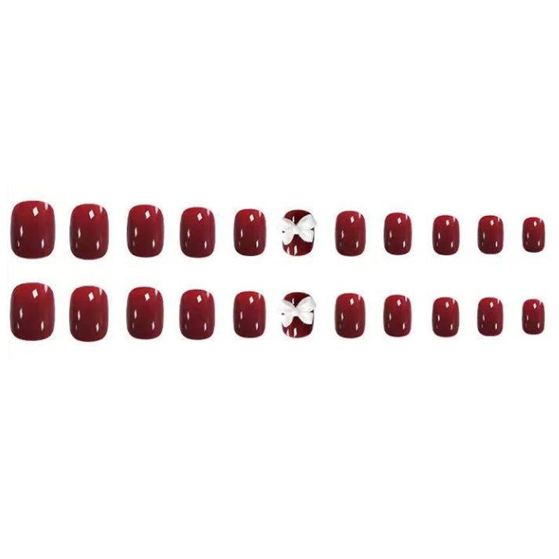Artificial nails with elegant bow motifs Kalsten