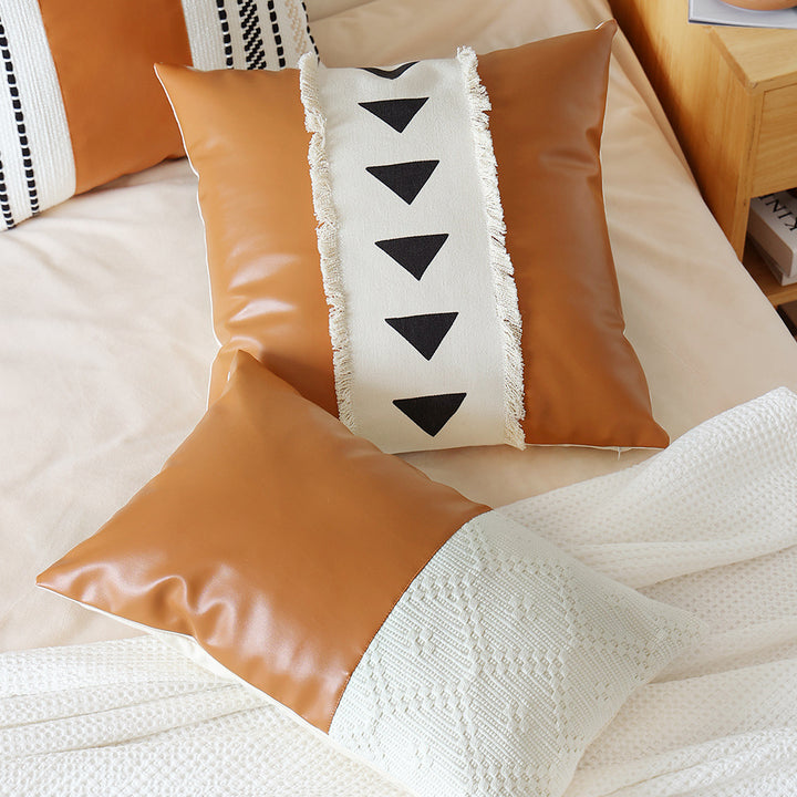 Decorative cushion cover made of faux leather with woven ethnic stripe Kalsten