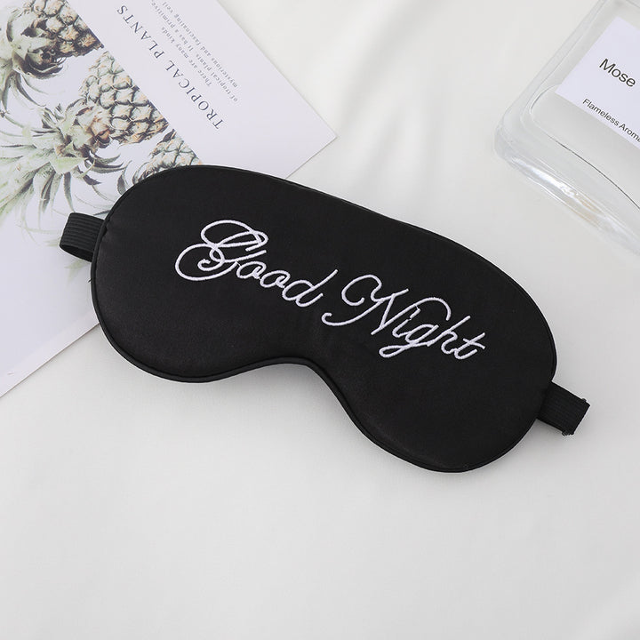 Unisex embroidered contoured sleep mask with decorative text embroidery and adjustable elastic band Kalsten