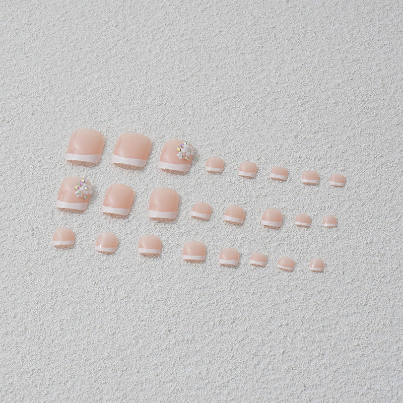 Artificial nail set with elegant French tip design and sparkling accents Kalsten