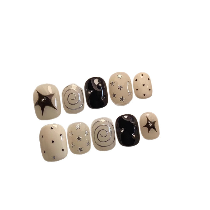 Artistic Press-On Nail Set with Star and Swirl Designs