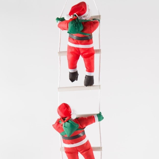 Decorative Santa Claus figures with ladder