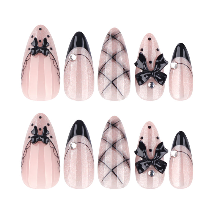 Artful Nail Art with Bow and Rhinestone Decorations Kalsten
