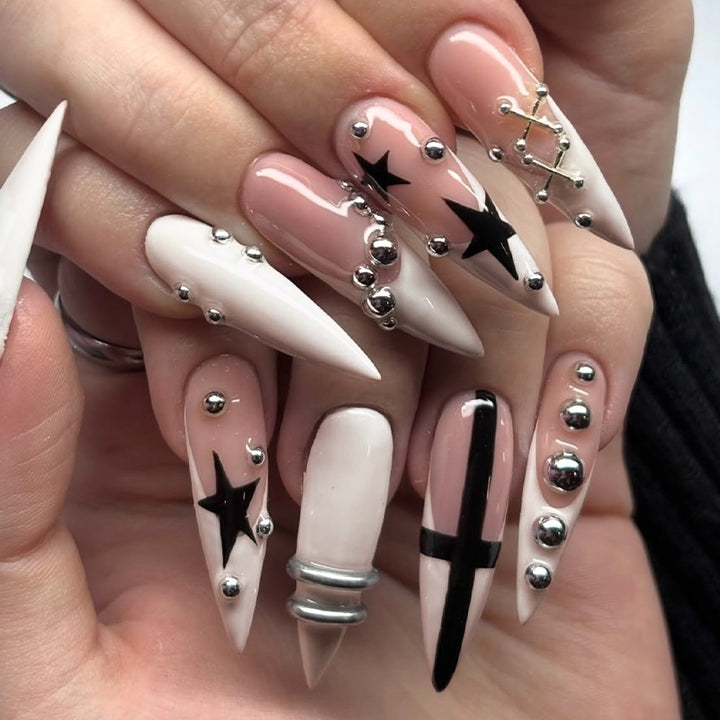 Acrylic nail set with stylish star and glitter accents Kalsten