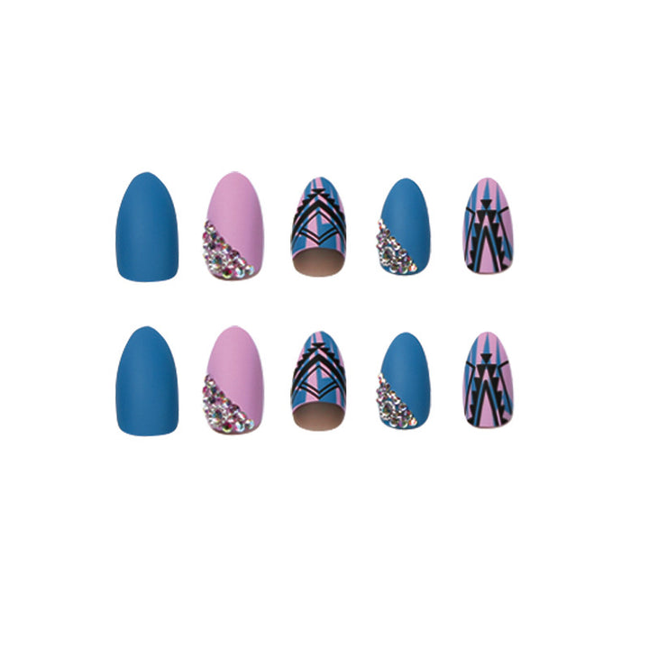 Artful stiletto nails with modern geometric designs and rhinestone embellishments Kalsten