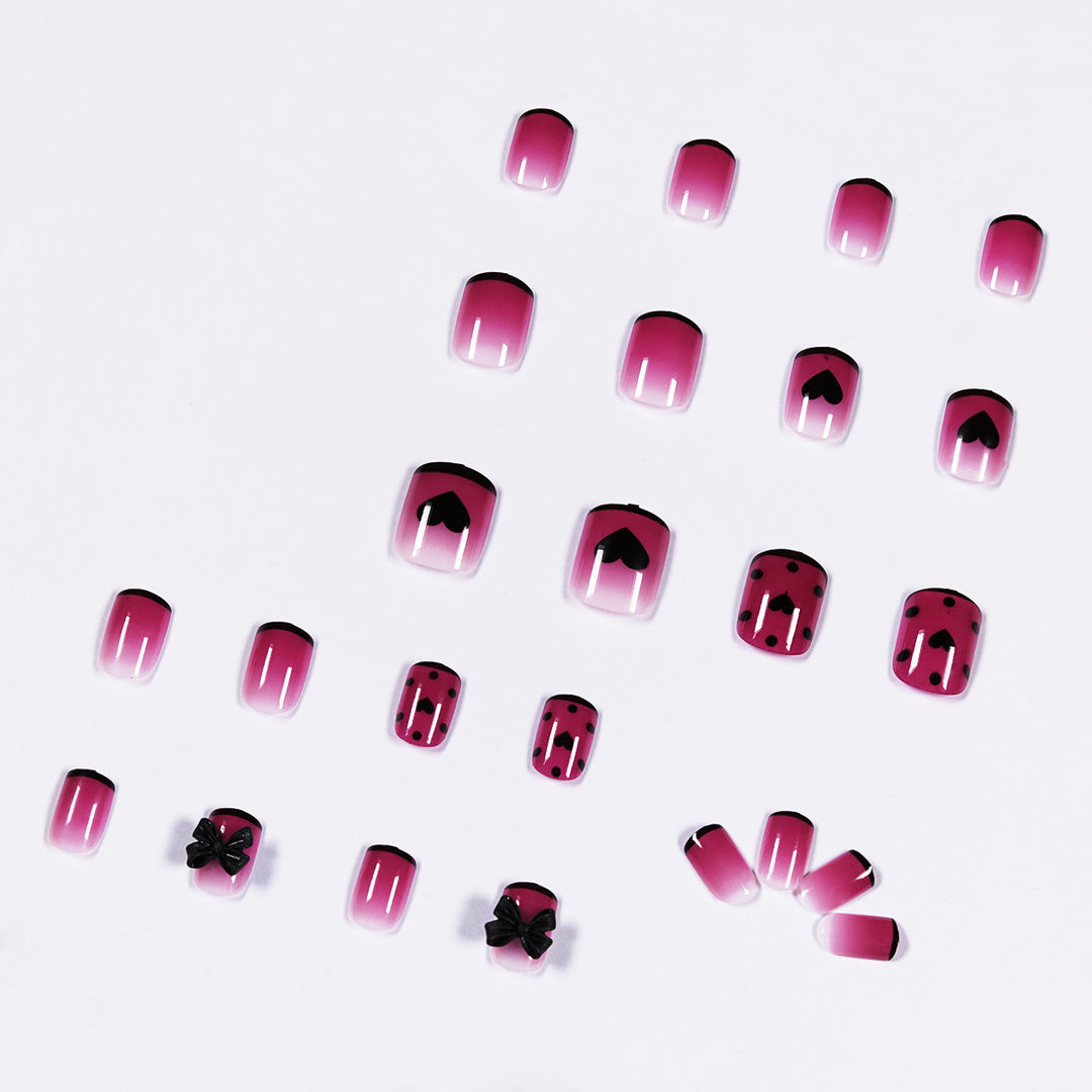 Artistic nail extensions with cute bow and heart designs Kalsten